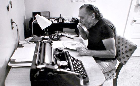 charles bukowski with typewriter