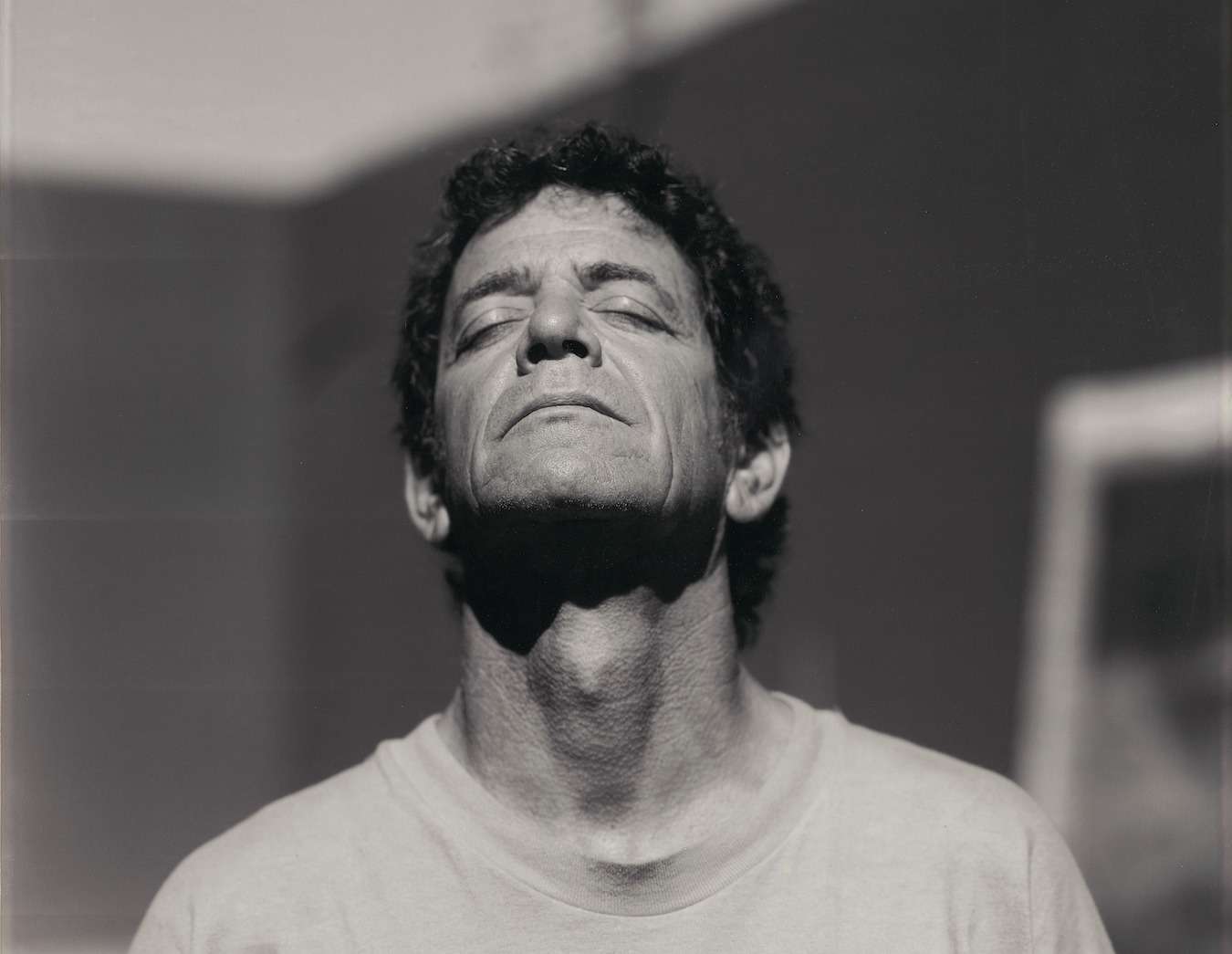 photo of lou reed meditating